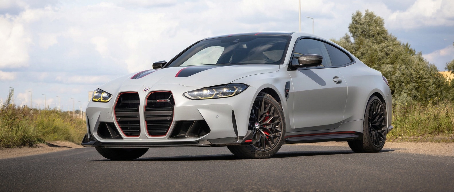 White BMW M4 with carbon fibre grille