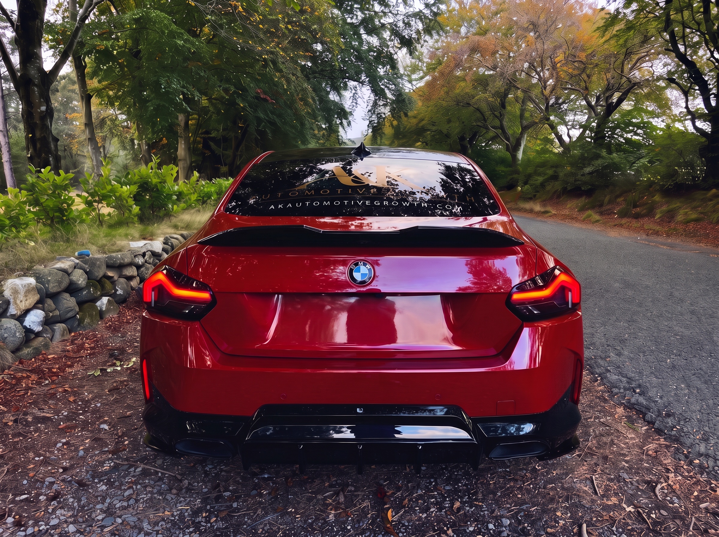 Red BMW in A&K Automotive Growth livery